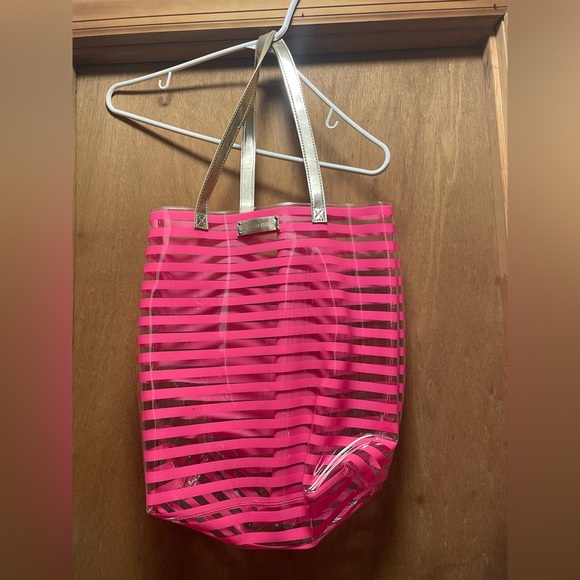 Victoria's Secret Handbags - Chic Pink and Gold Tote Bag with Spacious Interior